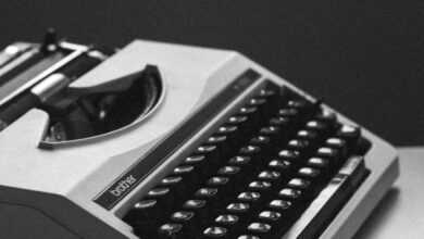 white and black typewriter close-up photography