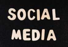 the word social media written in white type on a black background
