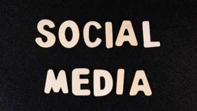 the word social media written in white type on a black background