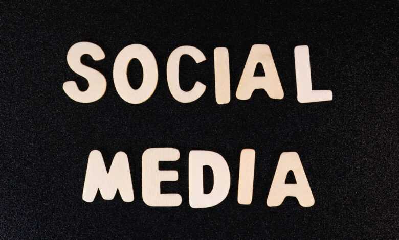 the word social media written in white type on a black background